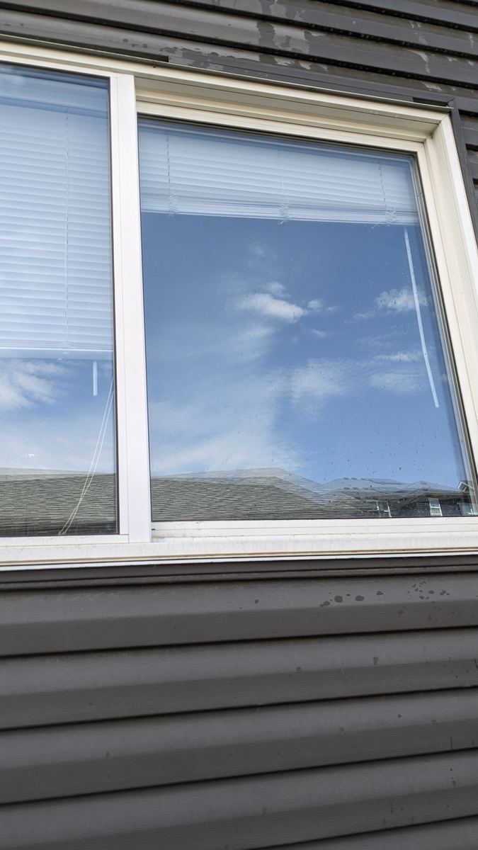 Streak-free window after professional cleaning, Calgary
