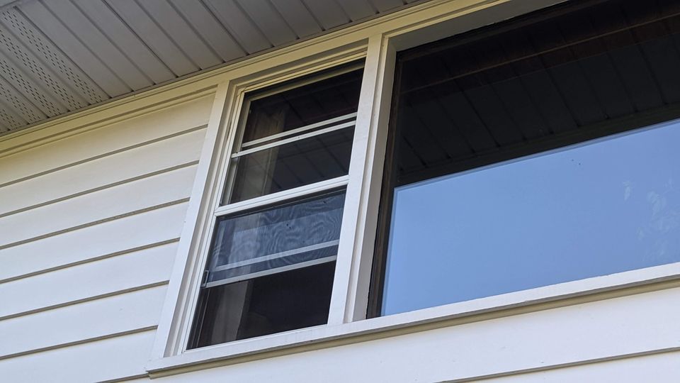 Clean exterior window and siding detail, Calgary home