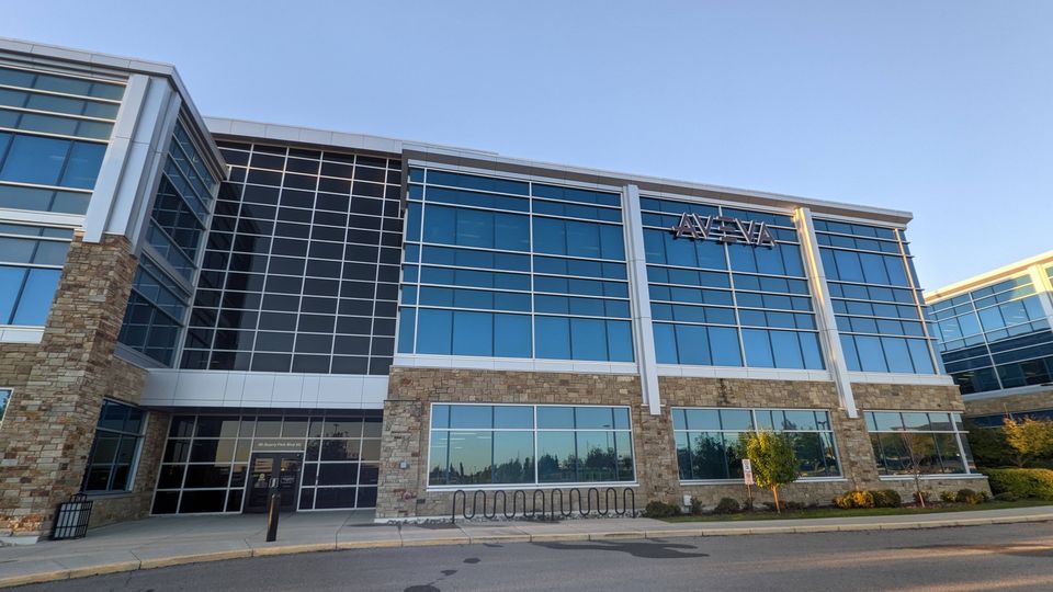 Multi-storey Calgary office building with floor-to-ceiling glass — commercial window cleaning