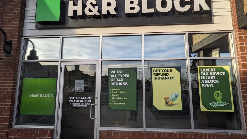Retail storefront windows after professional cleaning, Calgary